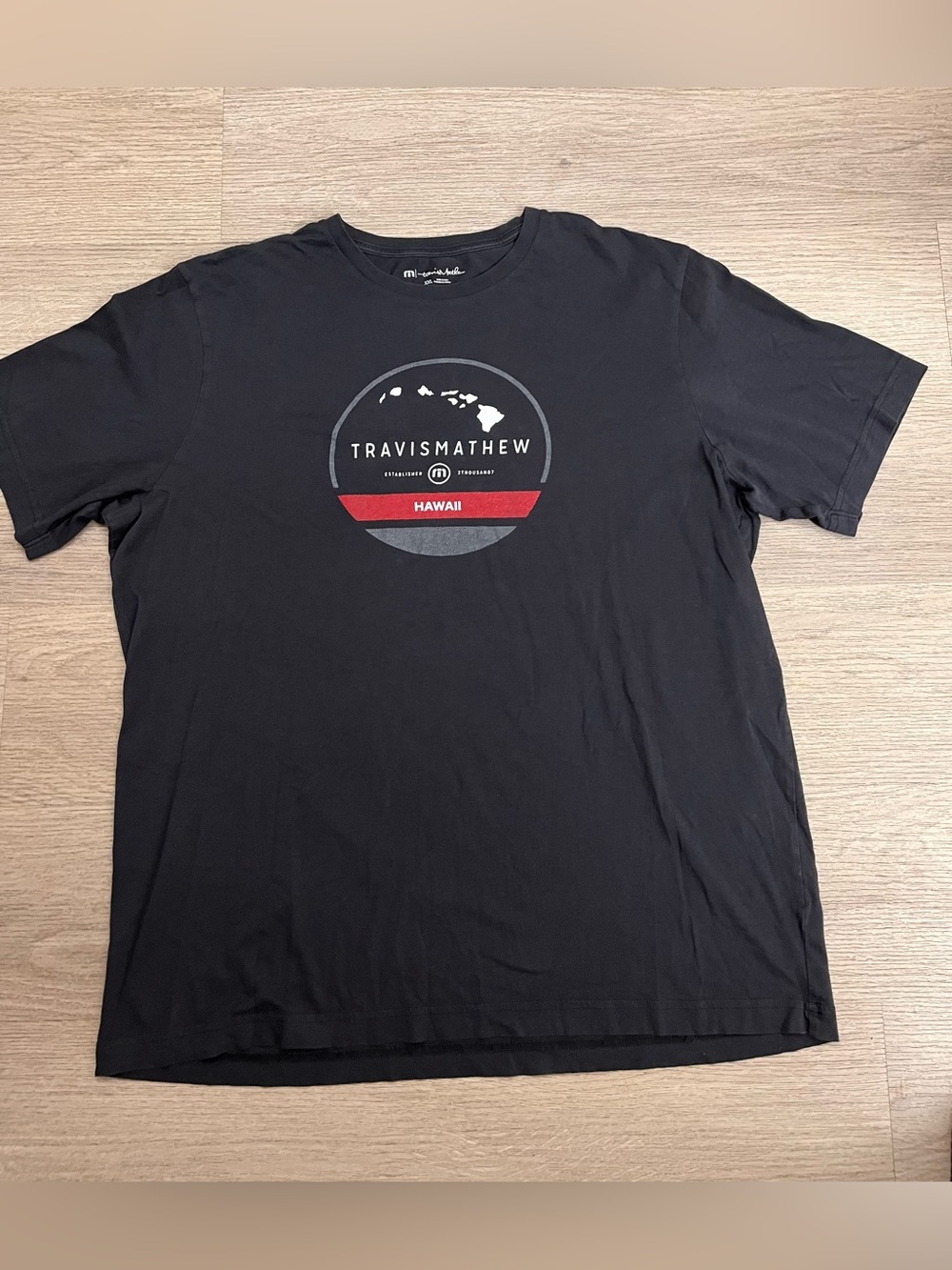 Travis Mathew Black Short Sleeve Hawaii Logo Tee with Red Accent